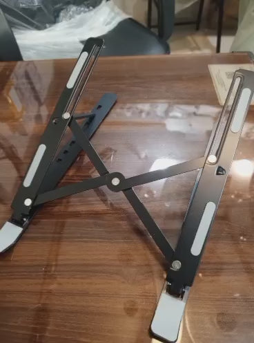 A portable, adjustable steel laptop stand